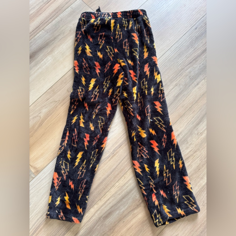 Black Pajama Pants with Orange and Yellow Zigzag Pattern